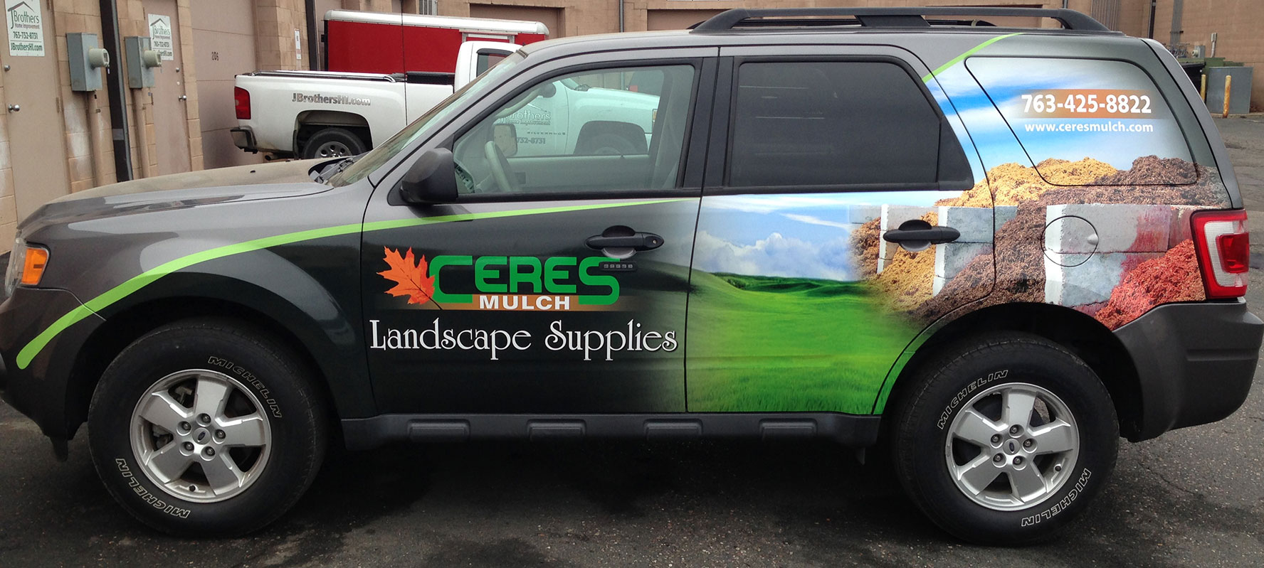 Vehicle graphic on SUV, Minnesota signs