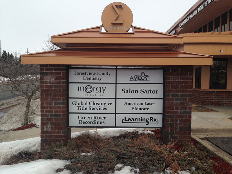 photo of mult-tenant sign in front of building